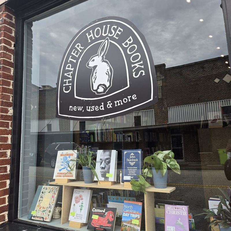 The Chapter House Books storefront window in downtown Fayetteville, NC